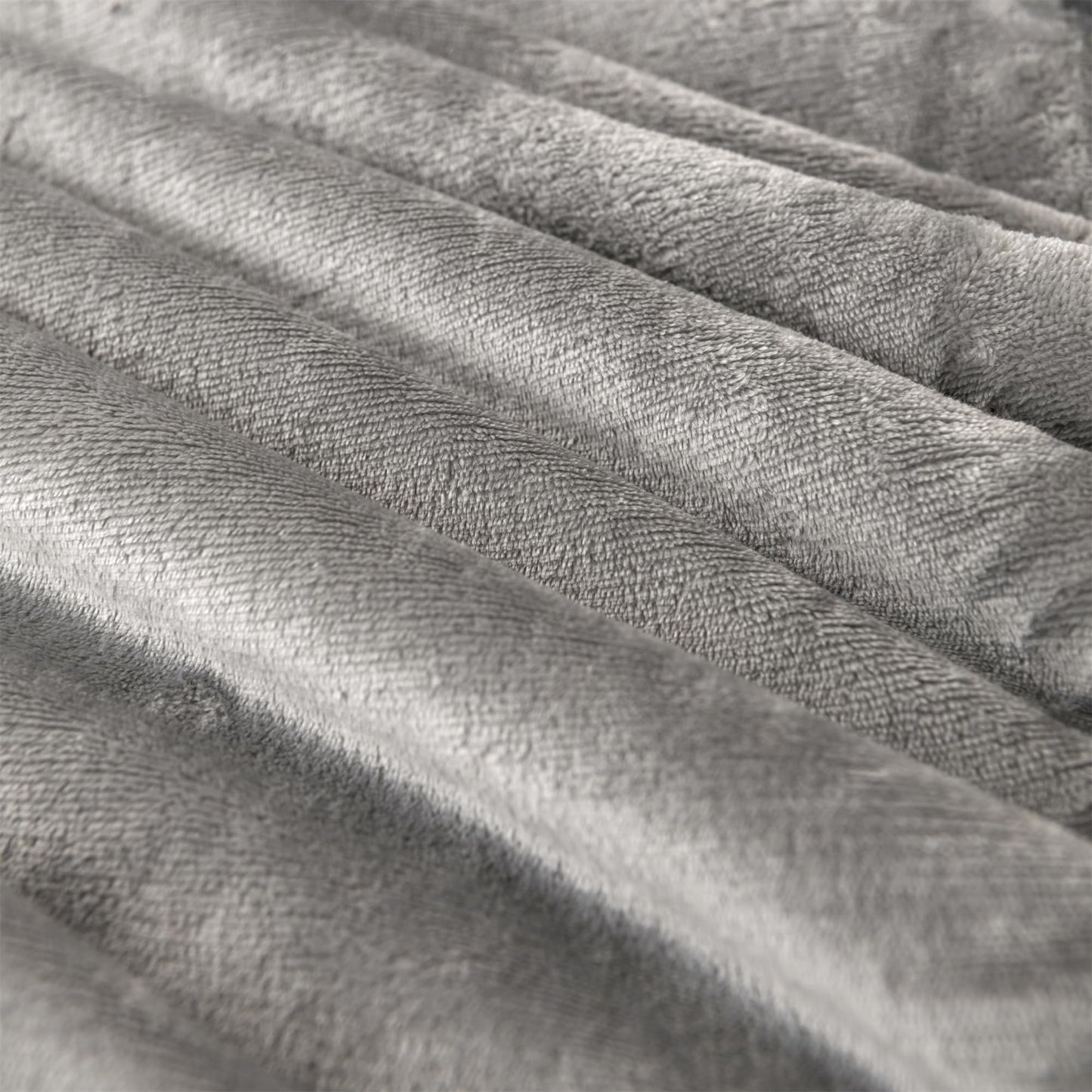 Plaid Gris Premium : La Touche Chic pour Vos Moments Cocooning