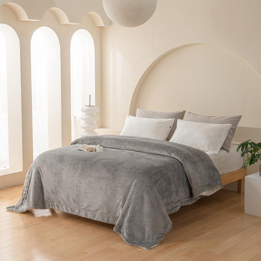 Plaid Gris Premium : La Touche Chic pour Vos Moments Cocooning