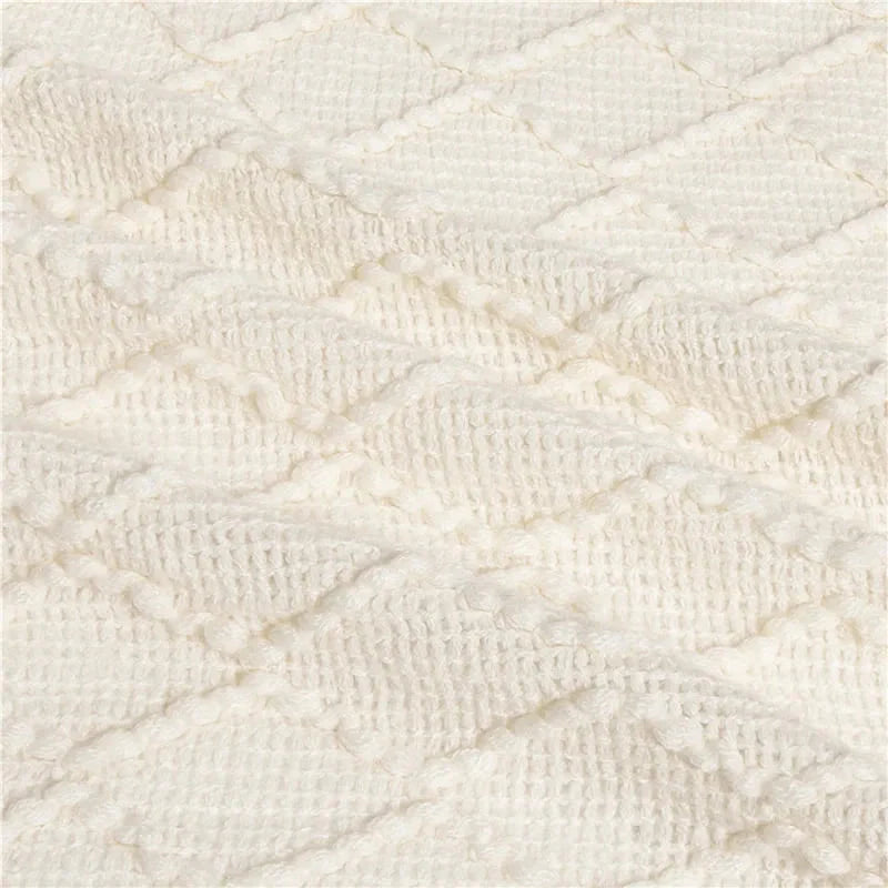 Plaid Beige Élégant : Douceur et Raffinement pour un Intérieur Chaleureux