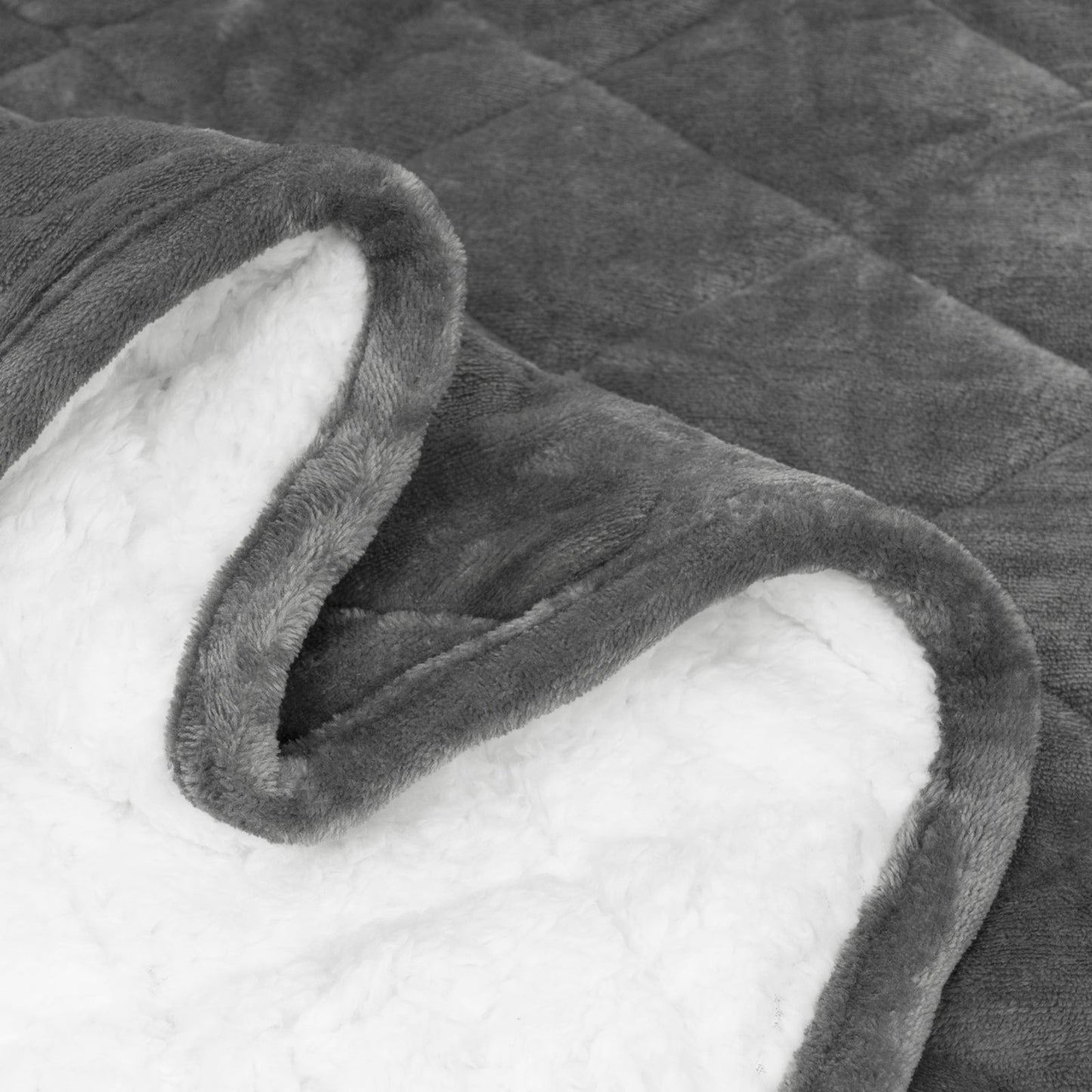 Couverture Lestée Sherpa Grise : Luxe, Confort et Sommeil Réparateur